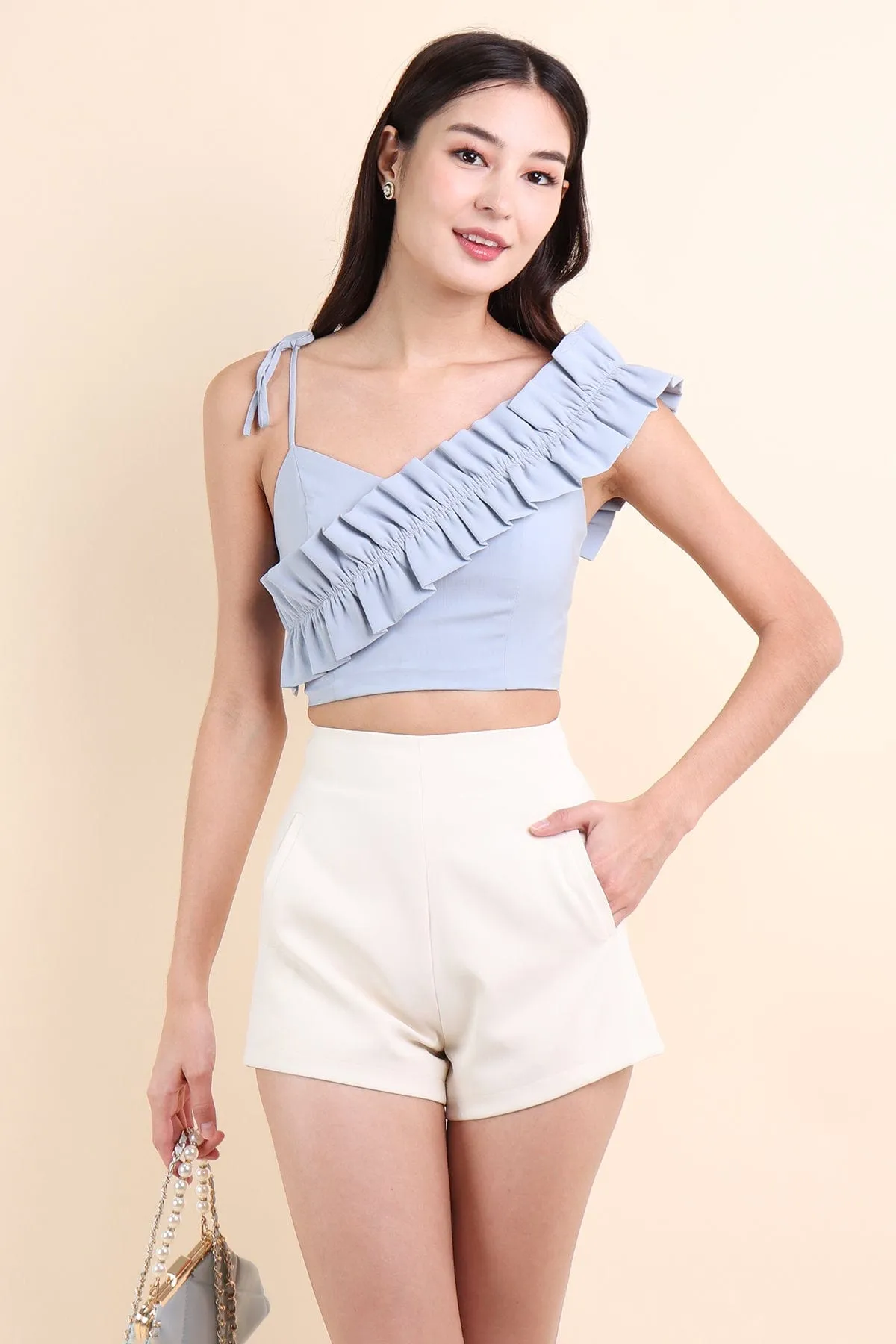 ELIANA RUFFLES SHOULDER TIE TOP IN FROST BLUE